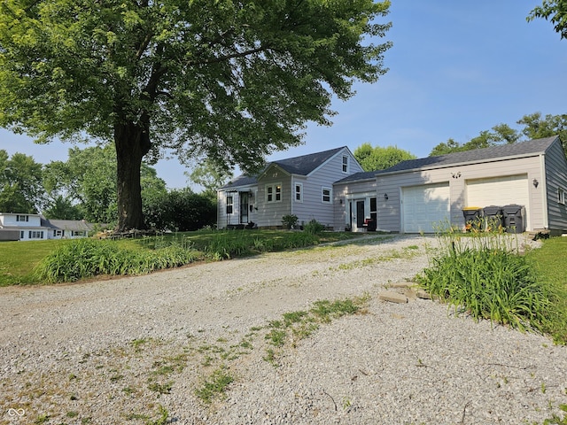 1510 Chester St, Anderson, IN 46012 - view of front facade with driveway and an attached garage