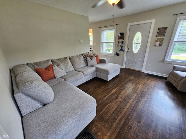 1510 Chester St, Anderson, IN 46012 - living room featuring dark wood-type flooring and a ceiling fan