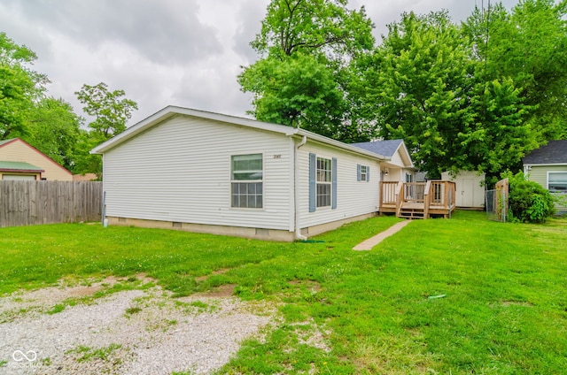 3149 Carson Ave, Indianapolis, IN 46227 - rear view of house featuring a deck