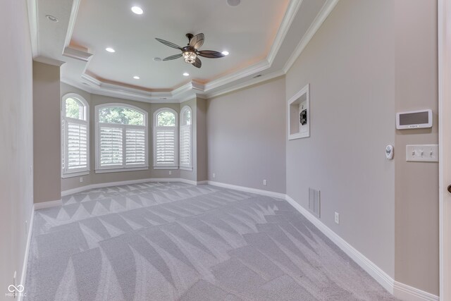 3795 Claybrook Ct, Bargersville, IN 46106 - spare room with crown molding, a tray ceiling, light carpet, ceiling fan, and recessed lighting