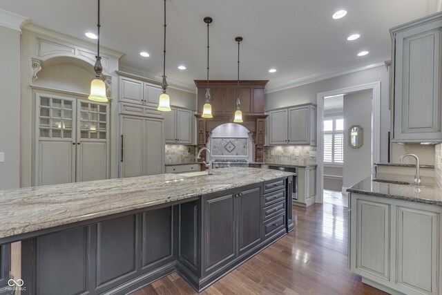3795 Claybrook Ct, Bargersville, IN 46106 - kitchen with ornamental molding, tasteful backsplash, light stone countertops, dark wood-style floors, and gray cabinets