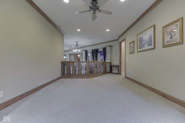 3795 Claybrook Ct, Bargersville, IN 46106 - unfurnished living room with ornamental molding, recessed lighting, light carpet, a ceiling fan, and a chandelier