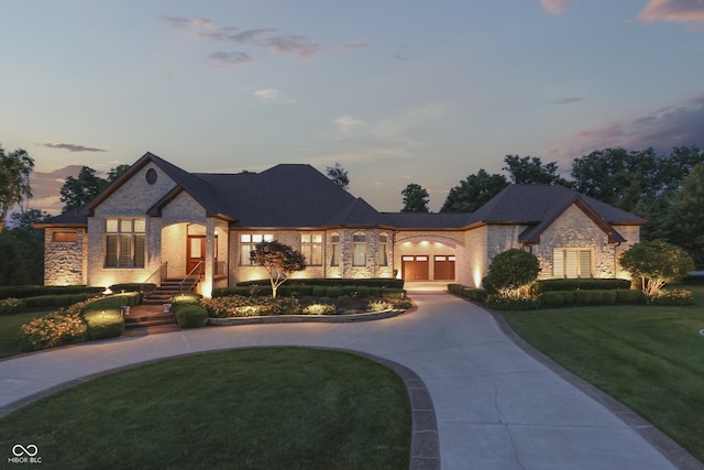 3795 Claybrook Ct, Bargersville, IN 46106 - french provincial home featuring curved driveway, stone siding, a front lawn, and brick siding