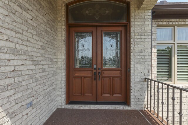 3795 Claybrook Ct, Bargersville, IN 46106 - view of exterior entry with brick siding and french doors