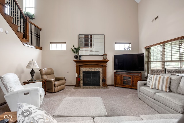 5194 Orahood Ct, Plainfield, IN 46168 - carpeted living area with a high ceiling and a fireplace