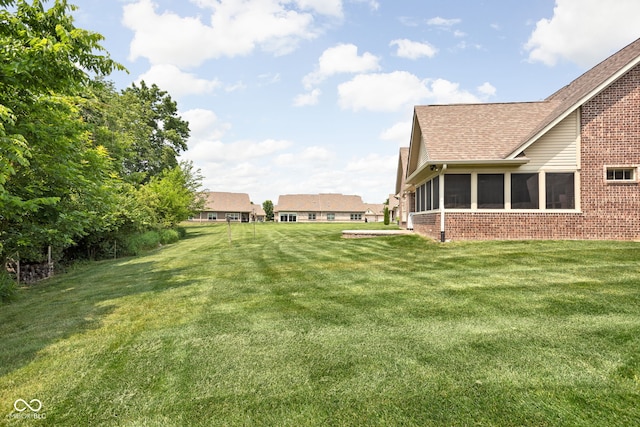 5194 Orahood Ct, Plainfield, IN 46168 - view of grassy yard with a sunroom