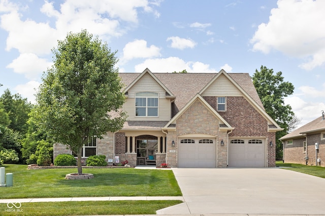 5194 Orahood Ct, Plainfield, IN 46168 - craftsman inspired home featuring driveway, stone siding, a front yard, and roof with shingles