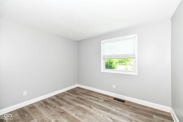 1543 W 79th St, Indianapolis, IN 46260 - spare room featuring wood finished floors