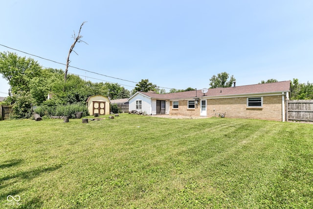 1543 W 79th St, Indianapolis, IN 46260 - view of yard with a storage unit