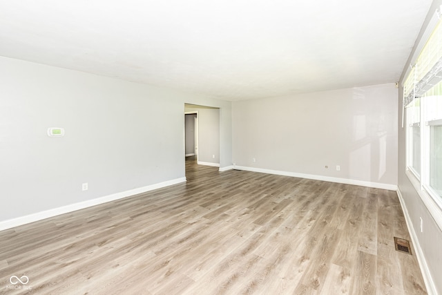 1543 W 79th St, Indianapolis, IN 46260 - empty room featuring light wood-style floors and baseboards