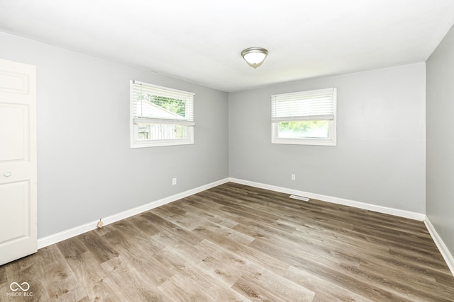 1543 W 79th St, Indianapolis, IN 46260 - unfurnished room with plenty of natural light and wood finished floors
