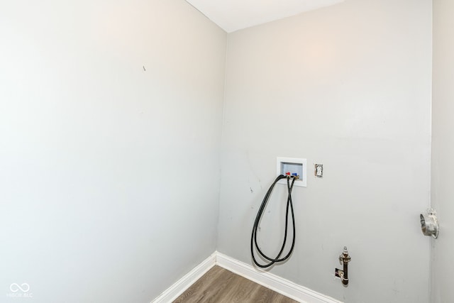 1543 W 79th St, Indianapolis, IN 46260 - washroom featuring hookup for a washing machine and wood finished floors