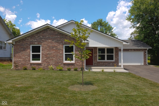 5122 W Legrande Ave, Indianapolis, IN 46241 - ranch-style house featuring brick siding, asphalt driveway, an attached garage, and a front lawn