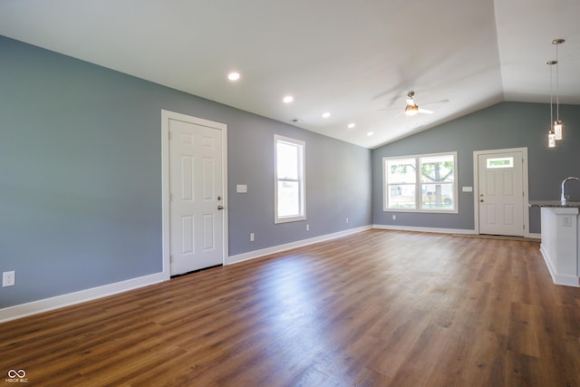 5122 W Legrande Ave, Indianapolis, IN 46241 - unfurnished living room with a ceiling fan, lofted ceiling, dark wood-style flooring, and recessed lighting