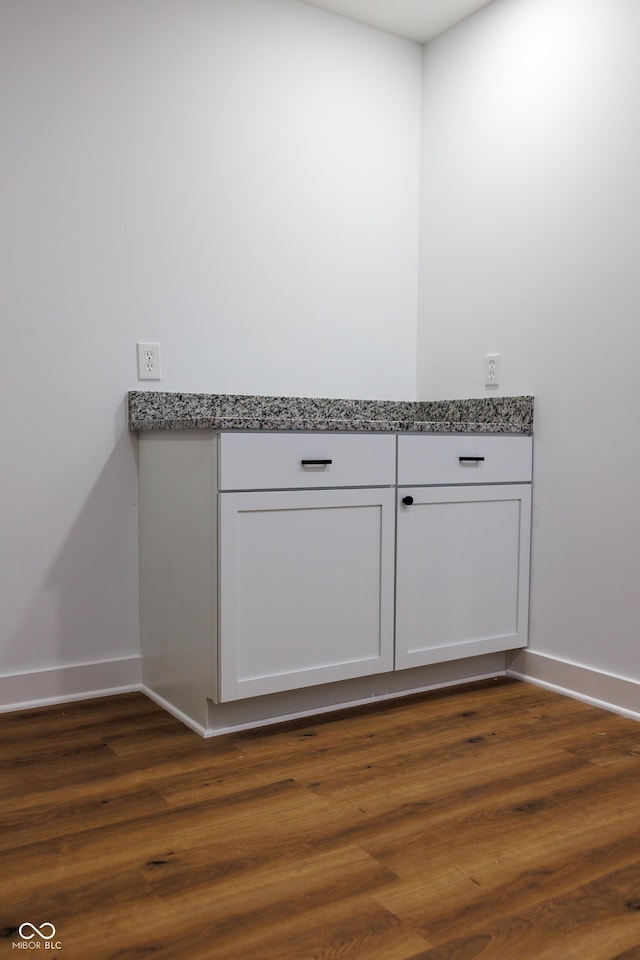 5122 W Legrande Ave, Indianapolis, IN 46241 - detailed view of baseboards and wood finished floors