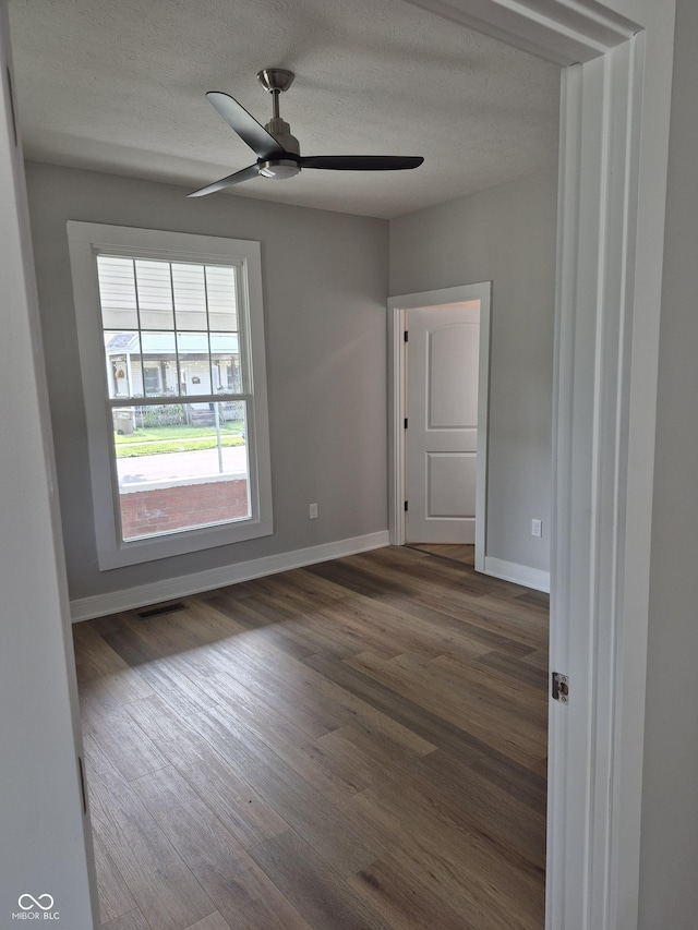 1501 California St, Columbus, IN 47201 - spare room featuring wood finished floors and ceiling fan