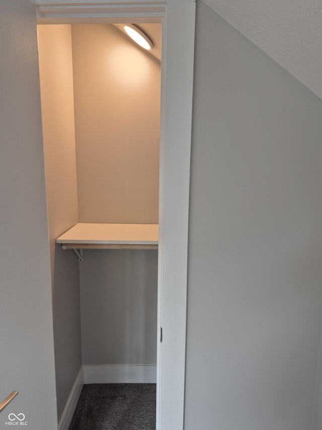 1501 California St, Columbus, IN 47201 - walk in closet featuring dark colored carpet
