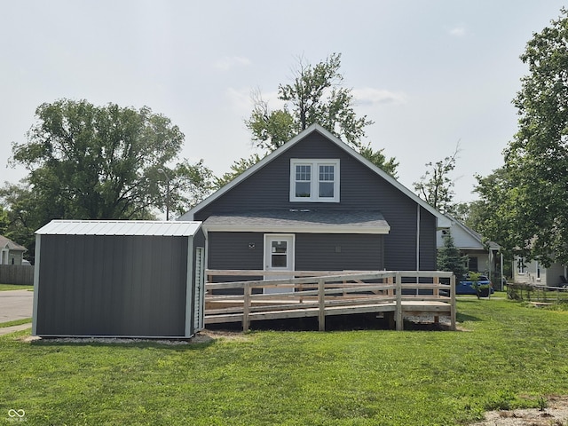 1501 California St, Columbus, IN 47201 - back of house featuring a yard, a deck, and a storage shed