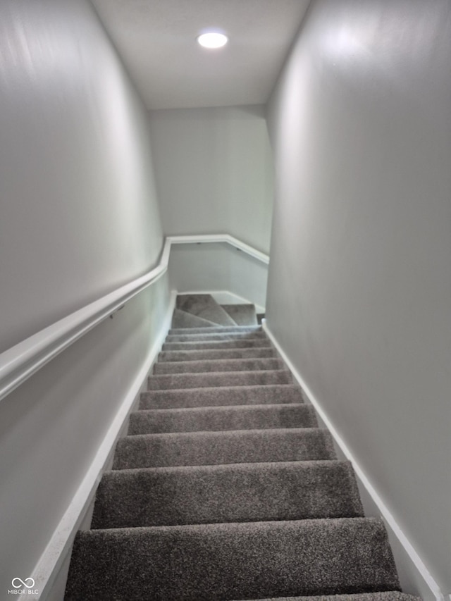 1501 California St, Columbus, IN 47201 - stairs with carpet and recessed lighting