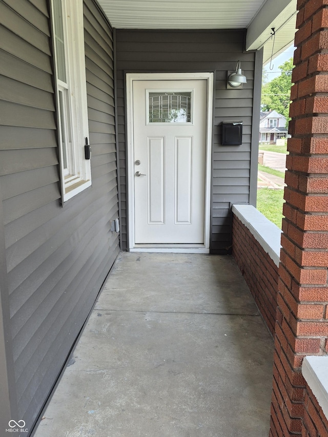 1501 California St, Columbus, IN 47201 - view of exterior entry with a porch