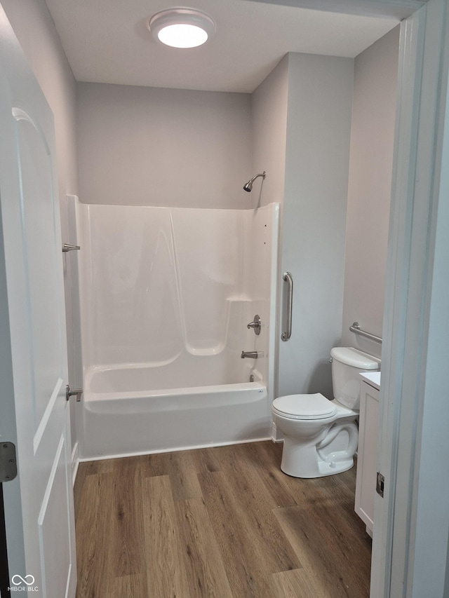 1501 California St, Columbus, IN 47201 - bathroom with wood finished floors, shower / tub combination, and vanity