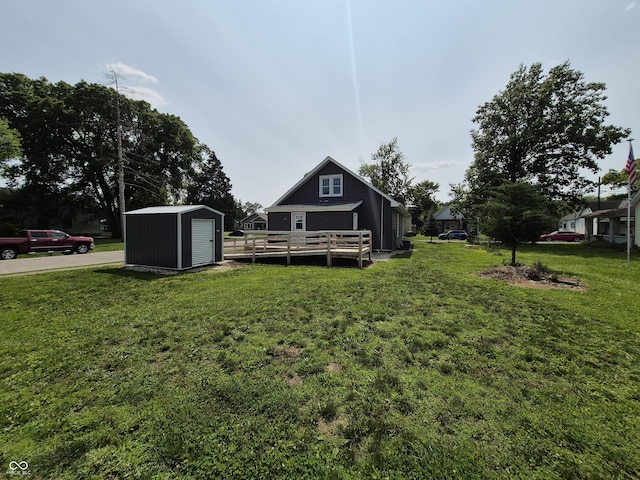 1501 California St, Columbus, IN 47201 - back of property featuring a shed, a lawn, and a deck