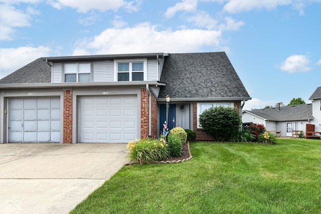 1124 Paradise Ct Unit B, Greenwood, IN 46143 - view of front of house featuring brick siding, driveway, a front lawn, and a shingled roof