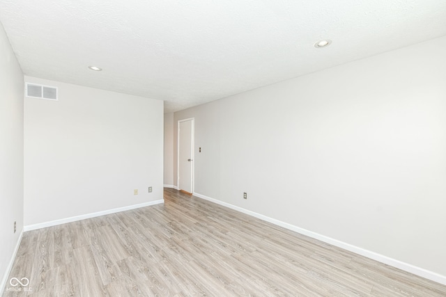 1124 Paradise Ct Unit B, Greenwood, IN 46143 - empty room featuring light wood-type flooring and recessed lighting