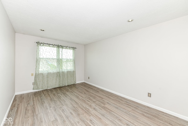 1124 Paradise Ct Unit B, Greenwood, IN 46143 - empty room with light wood finished floors and recessed lighting