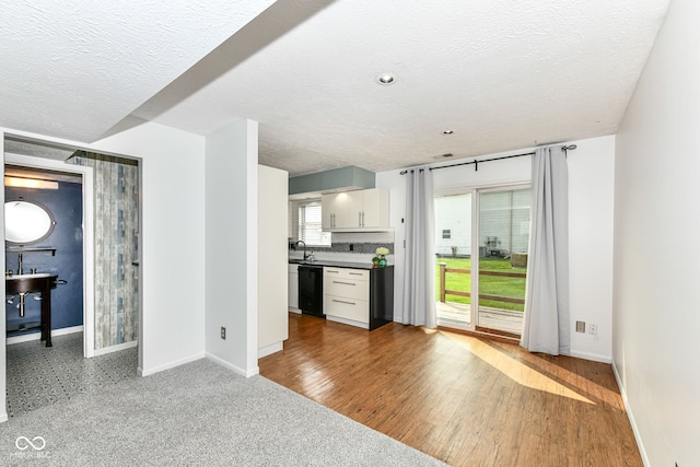 1124 Paradise Ct Unit B, Greenwood, IN 46143 - unfurnished living room with a textured ceiling