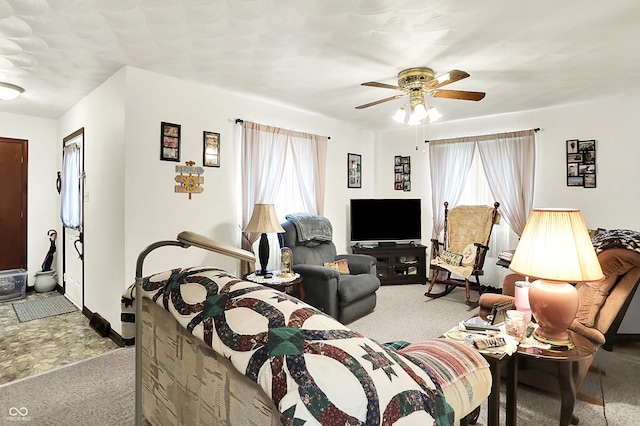 11630 Deanna Dr, Indianapolis, IN 46229 - carpeted living area with ceiling fan and baseboards