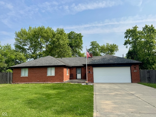11630 Deanna Dr, Indianapolis, IN 46229 - single story home featuring an attached garage, driveway, brick siding, and roof with shingles