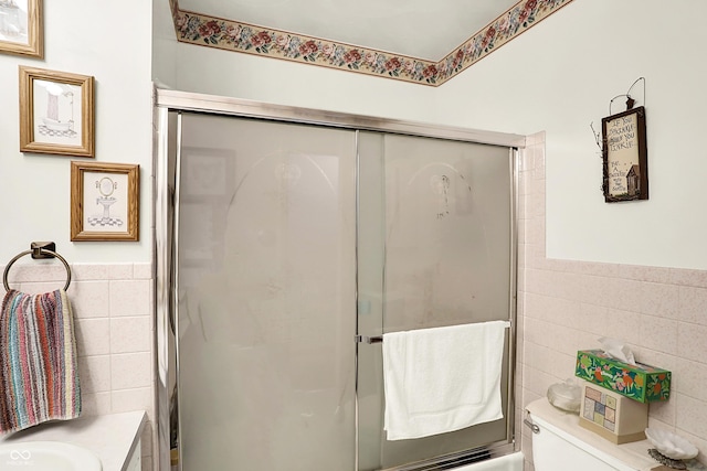 11630 Deanna Dr, Indianapolis, IN 46229 - full bathroom featuring tile walls and wainscoting