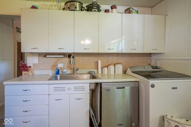 11 Sayre Dr, Greenwood, IN 46143 - kitchen featuring washer / clothes dryer, dishwasher, light countertops, and white cabinets