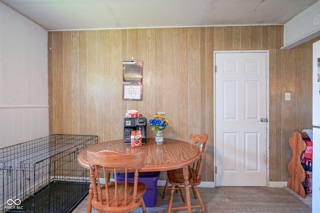 11 Sayre Dr, Greenwood, IN 46143 - dining area with wooden walls and wood finished floors