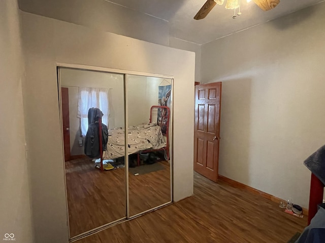 1163 Groff Ave, Indianapolis, IN 46222 - bedroom with wood finished floors, a ceiling fan, and a closet