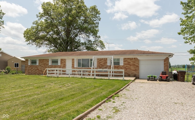 2170 N Old State Road 9, Columbus, IN 47203 - view of front of property with a garage, driveway, brick siding, and a front lawn