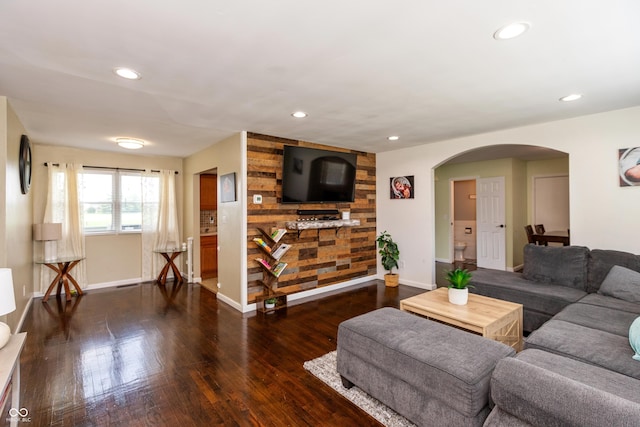 2170 N Old State Road 9, Columbus, IN 47203 - living area featuring arched walkways, wood finished floors, and recessed lighting