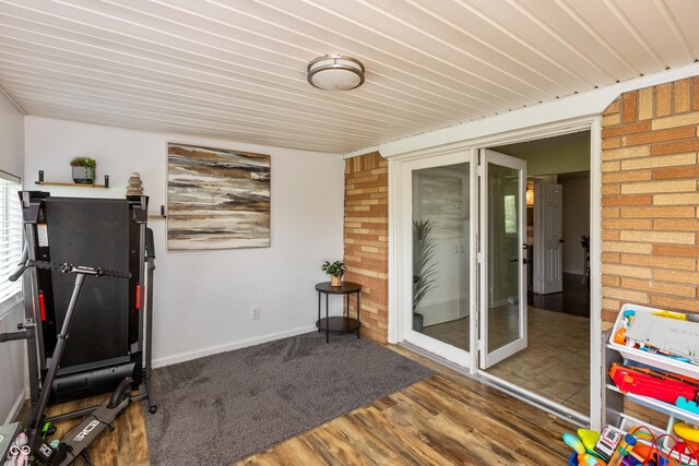 2170 N Old State Road 9, Columbus, IN 47203 - workout area with brick wall, wood finished floors, and wooden ceiling