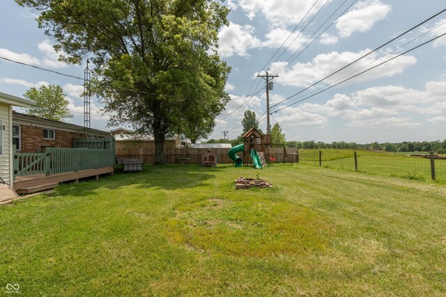 2170 N Old State Road 9, Columbus, IN 47203 - fenced backyard with a playground and a wooden deck