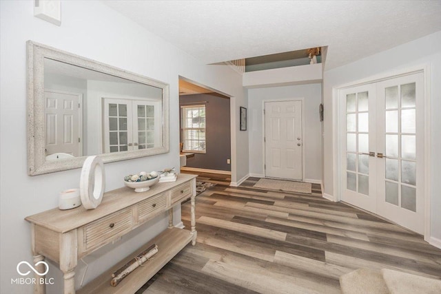12845 Touchdown Dr, Fishers, IN 46037 - foyer entrance featuring french doors and wood finished floors
