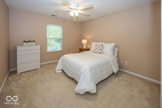 12845 Touchdown Dr, Fishers, IN 46037 - bedroom featuring light carpet and ceiling fan