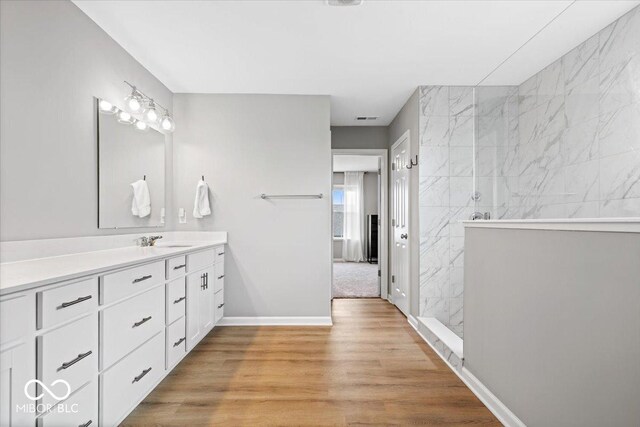 4253 Ironclad Dr, Bargersville, IN 46106 - full bathroom featuring vanity, walk in shower, and wood finished floors