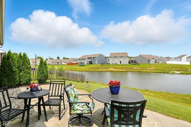 6315 Emerald Field Way, Indianapolis, IN 46221 - view of patio / terrace with a residential view and a water view
