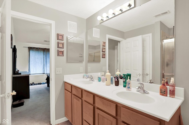 5011 Amber Creek Pl Unit 310, Indianapolis, IN 46237 - bathroom with double vanity and a shower with door