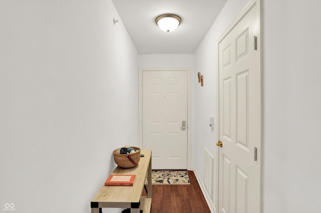 5011 Amber Creek Pl Unit 310, Indianapolis, IN 46237 - doorway featuring dark wood-style flooring and baseboards