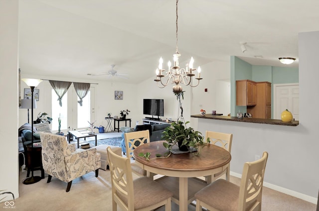 5011 Amber Creek Pl Unit 310, Indianapolis, IN 46237 - dining room with light carpet, a chandelier, lofted ceiling, and ceiling fan
