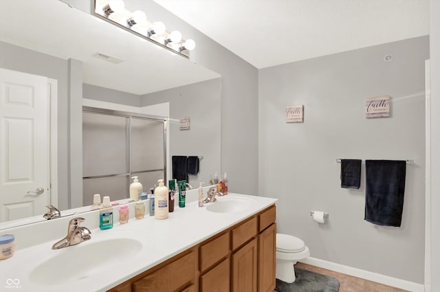 5011 Amber Creek Pl Unit 310, Indianapolis, IN 46237 - bathroom featuring a stall shower, double vanity, and tile patterned flooring