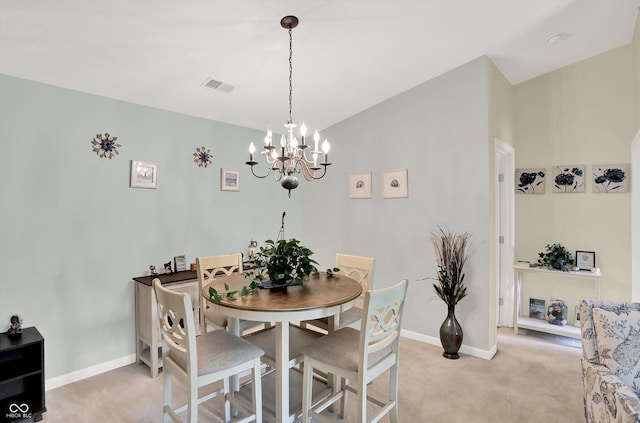 5011 Amber Creek Pl Unit 310, Indianapolis, IN 46237 - dining area featuring light colored carpet, a chandelier, and lofted ceiling