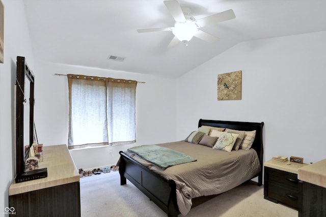 5011 Amber Creek Pl Unit 310, Indianapolis, IN 46237 - bedroom featuring light colored carpet, vaulted ceiling, and a ceiling fan